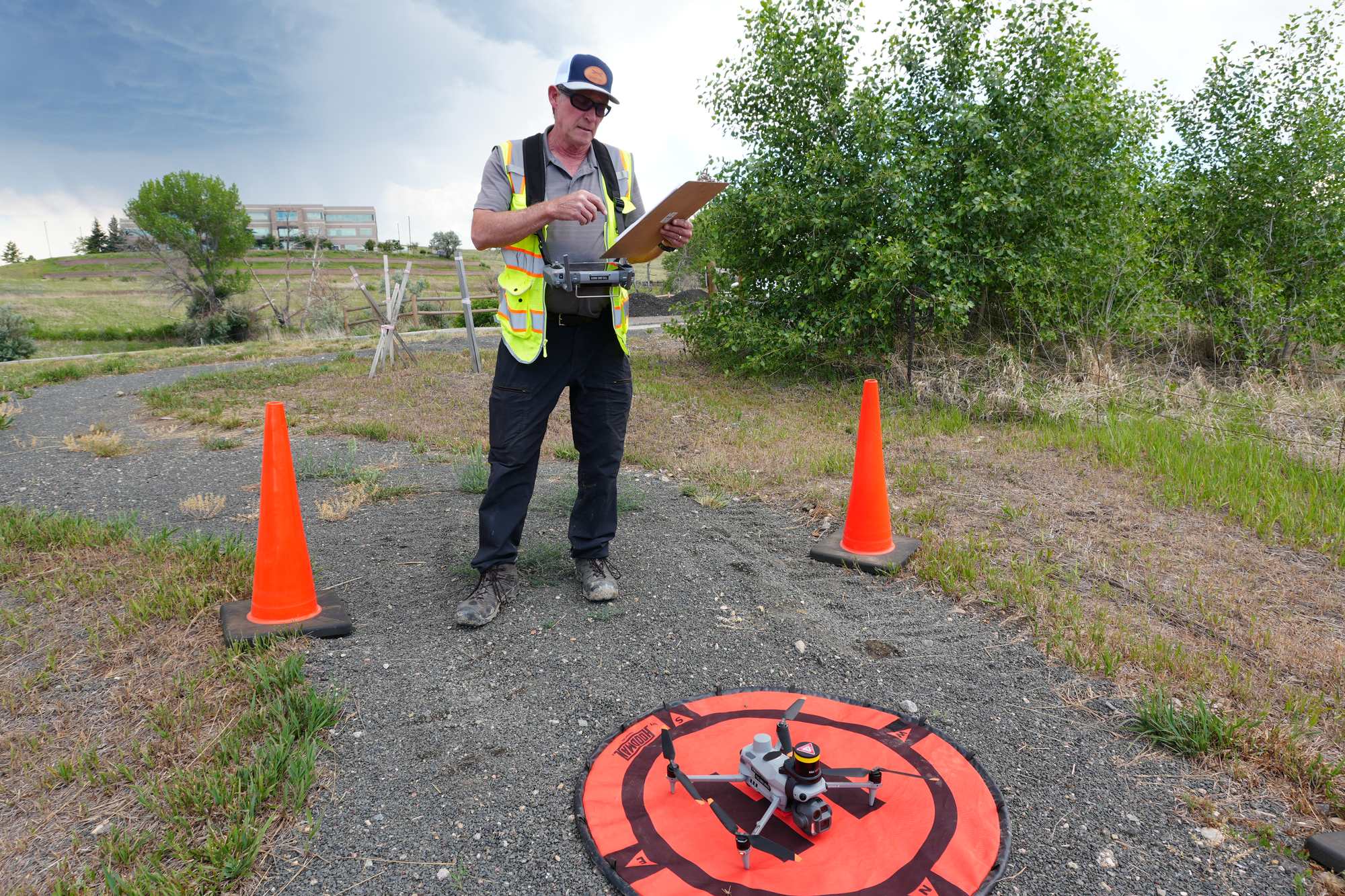 Dragonfly Aerials drone pilot on a Colorado construction site